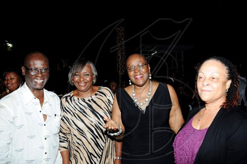 Winston Sill / Freelance Photographer
Kingston's Mayor Desmond McKenzie is surrounded by beauty as he lymes with (from second left) wife Marcia, Audrey Hinchcliffe and Doreen Frankson.

***************************************************************************
and host Appreciation Party, held at Eden Gardens, Lady Musgrave Road on Thursday night December 30, 2010.