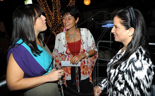 Rudolph Brown/Photographer
Carmela Azan-Richards, (left) chats with Stephanie McConnell (centre) and Lezanne Azan.




 at the launch of their Wealth Business Access TV Show launch at the Terra Nova Hotel in Kingston on Tuesday, January 4-2011.