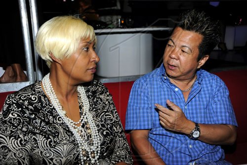 Rudolph Brown/Photographer
Brian Chung chat with Kim Lee at the launch of their Wealth Business Access TV Show launch at the Terra Nova Hotel in Kingston on Tuesday, January 4-2011.