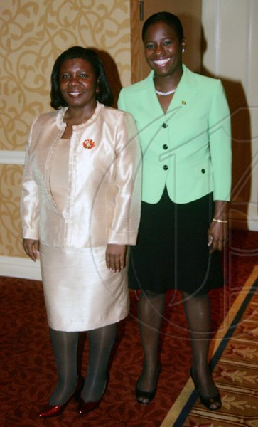 Barbara Ellington/Lifestyle Editor
Deputy Chief of Mission, Sharon Miller (left) and her secretary Shernett Burton take a break from official duties for a photograph.