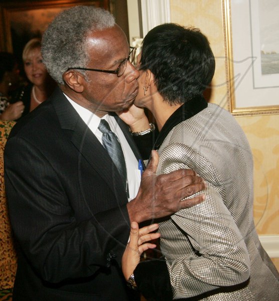 Barbara Ellington/Lifestyle Editor
Ambassador Marks gets greeted with a kiss from Sir George Alleyne.