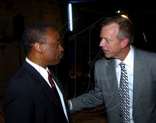 Winston Sill / Freelance Photographer
Andrews Memorial Hospital and Florida Hospital host function in Celebration of Partnership and Signing of Agreement, held at Andrews Hospital Complex, Hope Road on Thursday August 12, 2010. Here are Milton Samuda (left), President, Chamber of Commerce; and Lars Houmann (right), President and CEO, Florida Hospital.