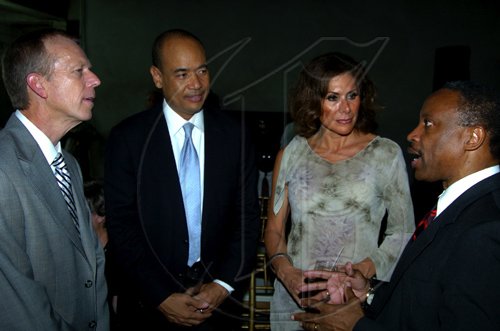 Winston Sill / Freelance Photographer
Andrews Memorial Hospital and Florida Hospital host function in Celebration of Partnership and Signing of Agreement, held at Andrews Hospital Complex, Hope Road on Thursday August 12, 2010. Hereare Lars Houmann (left); Wayne Chen (second left); Mexican Ambassador Lenora Rueda (second right); and Milton Samuda (right).
