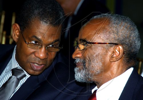 Winston Sill / Freelance Photographer
Andrews Memorial Hospital and Florida Hospital host function in Celebration of Partnership and Signing of Agreement, held at Andrews Hospital Complex, Hope Road on Thursday August 12, 2010. Here are Alton Morgan (left); and Dr. Lambert Innis (right).