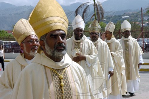 Rudolph Brown/Chief Photographer
The Rt. Rev. Dr. Robert Thompson, (forefront) Anglican Bishop of Kingston and members of the clergy enter the National Arena for the Diocese of Jamaica and the Cayman Islands, Order of Service on the occasion of the meeting of the Anglican Consultative Council on Sunday, May 3-2009.