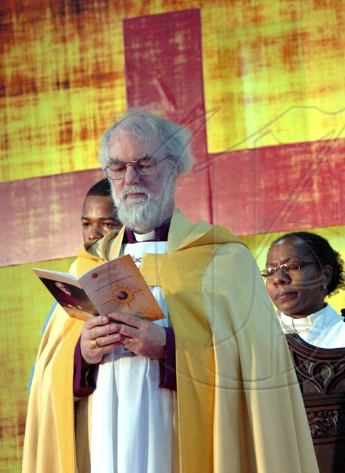 Rudolph Brown/Chief Photographer
Archbishop of Canterbury The Most Rev. and Rt. Hon. Dr. Rowan Williams enter the National Arena for the Diocese of Jamaica and the Cayman Islands, Order of Service on the occasion of the meeting of the Anglican Consultative Council on Sunday, May 3-2009.