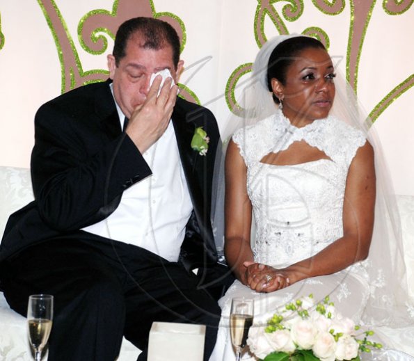 Colin Hamilton/Freelance Photographer
Audley Shaw and Susan Duhaney's weds on Sunday March 21, 2010 at their St. Andrew home followed by a reception at the Terra Nova Hotel.
A softer side to the minister who is caught wiping away tears.