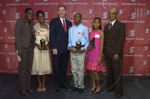 Gladstone Taylor / Photographer

Left to right: Joylene Griffiths Irving,  Kaydian Farquharson, Wayne Powell, Daniel Lawla,  Anya Chuck and  Bruce Bowen as seen at the Scotia Jamaica Foundation Shining Star Scholarship awards luncheon on August 26, 2010