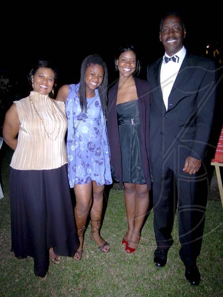 Winston Sill / Freelance Photographer
The Parnell family (from left) Tammie Parnell; Taylor Parnell; Lindsay Parnell and Isiah Parnell, the US Charge d'Affairs.
American Women's Group (AWG) host Fundraising Dinner, held at Mark Way, Cherry Gardens on Thursday night December 17, 2009.