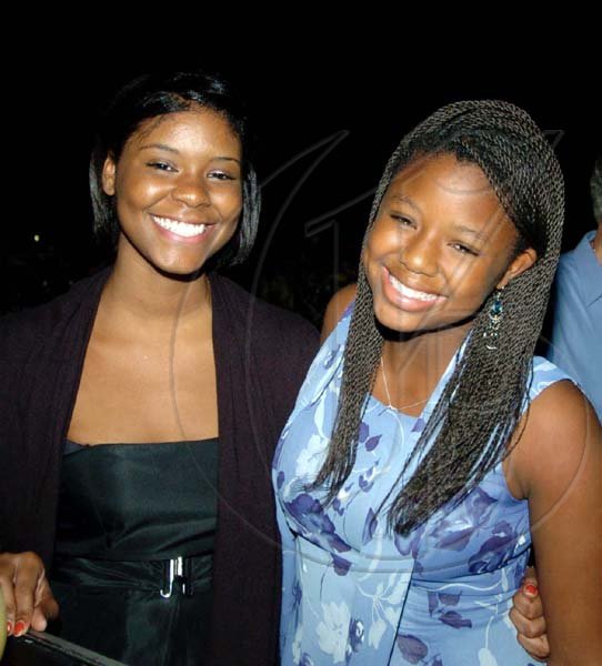 Winston Sill / Freelance Photographer
Lindsay (left) and Taylor Parnell show us they pay regular visits to the dentist with these perfect smiles at the American Women's Group dinner, held at Mark Way, Cherry Gardens.




 on Thursday night December 17, 2009. Here are