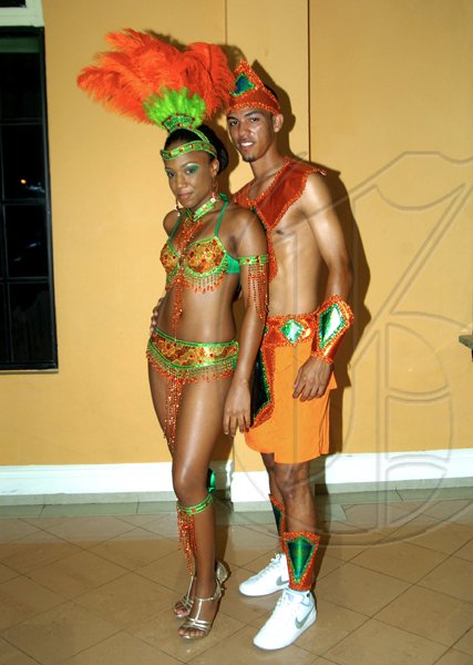A beautiful combination of vibrant shades of orange and green.  Models Kandice Matthews and Jonathan Cabralis show off the Acropolis sponsored costume 

*******************************************************************************at the launch of Bacchanal 2010.

********************************************************************

Winston Sill / Freelance Photographer
Launch of Bacchanal Jamaica 2010 Carnival Season, under the theme "Bacchanal Treasures", held at Knutsford Court Hotel New Kingston on Wedneday January 20, 2010.