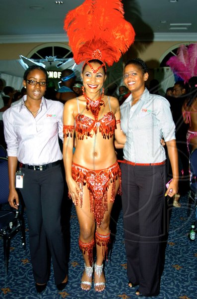 Jhnnell Eastman (centre), shows off the Digicel sponsored Bacchanal Jamaica 2010 costume as  Digicel's Tahnida Nunes (left) and Tracy-Ann Thelwell get a photo opportunity.

***************************************************************************. They were at the launch of Bacchanal Jamaica 2010.


Winston Sill / Freelance Photographer
Launch of Bacchanal Jamaica 2010 Carnival Season, under the theme "Bacchanal Treasures", held at Knutsford Court Hotel New Kingston on Wedneday January 20, 2010.