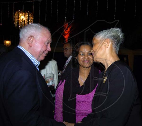 Winston Sill / Freelance Photographer
Glen Lee (right) retired staff member at FirstCaribbean International Bank had to add her farewells to Chris Bovell. Looking on is Janet Pryce.

 Function for Christopher Bovell, held at the Jamaica Pegasus Hotel, New Kingston night December 17, 2009.