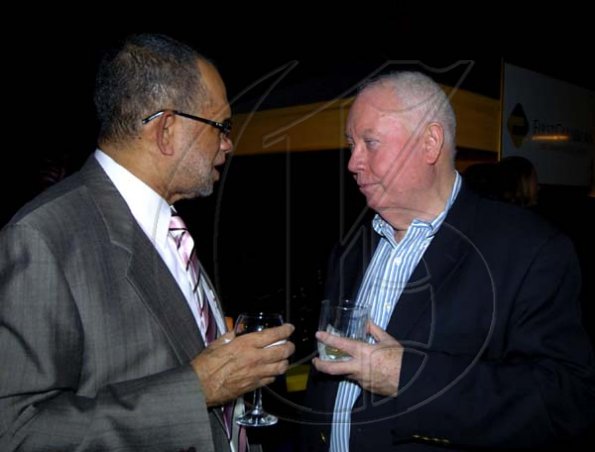 Winston Sill / Freelance Photographer
FirstCaribbean (Jamaica) boss Clovis Metcalfe (left) 'holds a reason' with former director of the bank Chris Bovell.

Bank Farewell Function for Christopher Bovell, held at the Jamaica Pegasus Hotel, New Kingston night December 17, 2009.