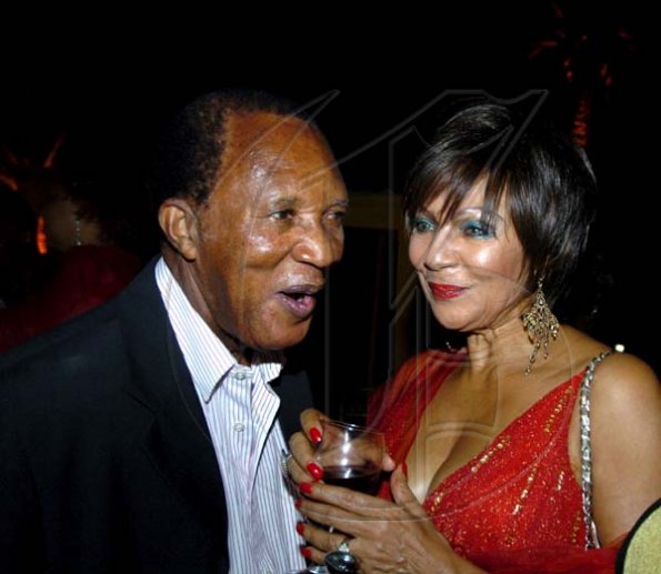 Winston Sill / Freelance Photographer
Everyone wanted to say hi to Al Webb including Michelle Bovell.

First Caribbean Bank Farewell Function for Christopher Bovell, held at the Jamaica Pegasus Hotel, New Kingston night December 17, 2009.