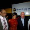 Winston Sill / Freelance Photographer
FirstCaribbean (Jamaica operations) Managing Director Clovis Metcalfe (left) and FirstCaribbean Chairman Michael Mansoor (right) sandwich the happy couple, Chris and Michelle Bovell.
Bank Farewell Function for Christopher Bovell, held at the Jamaica Pegasus Hotel, New Kingston night December 17, 2009.