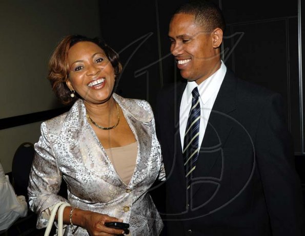 Rudolph Brown/Photographer
Beverley Ferguson-Smith chat with Ainsley Watson and at the Sagicor Life Jamaica Half Way Tree branch annual awards breakfast at the Jamaica Pegasus Hotel in New Kingston on Friday, March 26-2010.