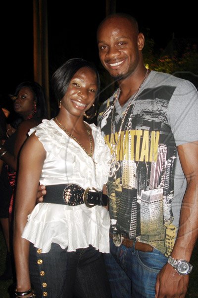 Barbara Ellington/Lifestyle Editor
Champions Melaine Walker and Asafa Powell out to celebrate with their friend Brigitte.

*******************************************************************Brigitte's birthday party held at Earl's Court, St. Andrew on Saturday November 7, 2009.