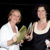 Colin Hamilton/freelance photographer
FAN CLUB: Dr. Barbara Munske-Cresswell left) and the British High Commission's  project officer, Jo Seaman deal with the tropical weather during the reception for the British DPP Keir Starmer, QC..

****************************************************************** at the British High Commission on Monday September 28, 2009.