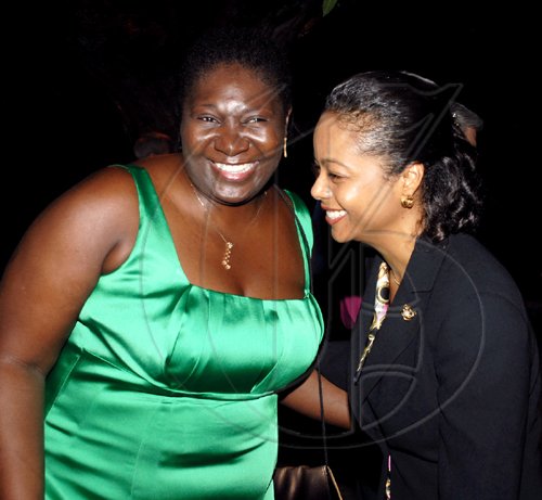 Colin Hamilton/freelance photographer
From left Pesident of the Resident Magistrate's?Association, Judge?Cresencia Brown and Sen. The Hon. Marlene Malahoo-Forte (former president RM Assn) shares a laugh during a reception for the British DPP Keir Starmer, QC at the British High Commission on Monday September 28, 2009.