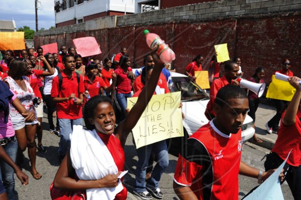 Ricardo Makyn/Staff Photographer.
University Students protesting against Minister of Education Andrew Holness because of the withdrawal of a subsidy to Tertiary level Students  on Tuesday 13.4.2010