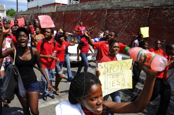 Ricardo Makyn/Staff Photographer.
University Students protesting against Minister of Education Andrew Holness because of the withdrawal of a subsidy to Tertiary level Students  on Tuesday 13.4.2010