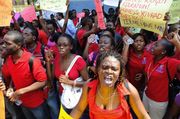 Ricardo Makyn/Staff Photographer.
University Students protesting against Minister of Education Andrew Holness because of the withdrawal of a subsidy to Tertiary level Students  on Tuesday 13.4.2010