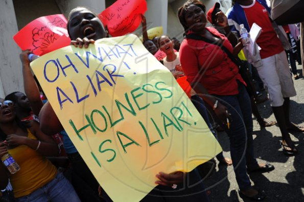 Ricardo Makyn/Staff Photographer.
University Students protesting against Minister of Education Andrew Holness because of the withdrawal of a subsidy to Tertiary level Students  on Tuesday 13.4.2010