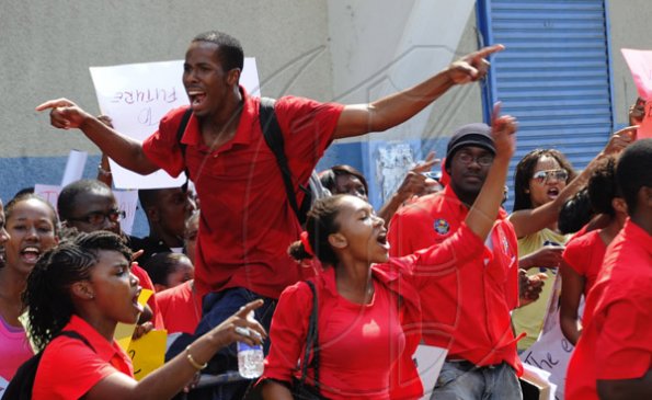Ricardo Makyn/Staff Photographer.
University Students protesting against Minister of Education Andrew Holness because of the withdrawal of a subsidy to Tertiary level Students  on Tuesday 13.4.2010