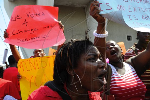 Ricardo Makyn/Staff Photographer.
University Students protesting against Minister of Education Andrew Holness because of the withdrawal of a subsidy to Tertiary level Students  on Tuesday 13.4.2010