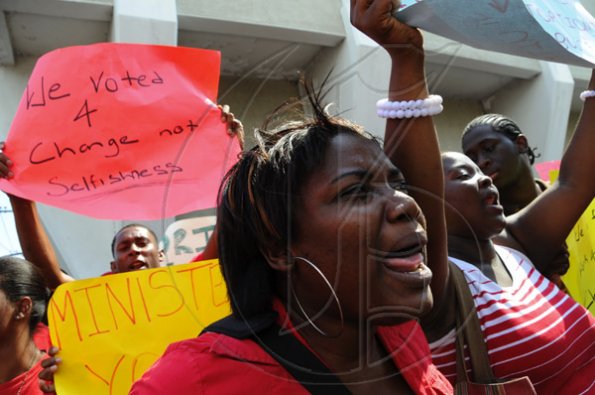 Ricardo Makyn/Staff Photographer.
University Students protesting against Minister of Education Andrew Holness because of the withdrawal of a subsidy to Tertiary level Students  on Tuesday 13.4.2010 Ricardo Makyn/Staff Photographer.
University Students protesting against Minister of Education Andrew Holness because of the withdrawal of a subsidy to Tertiary level Students  on Tuesday 13.4.2010