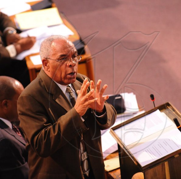 Ricardo Makyn/Staff Photographer.
The Hon Omar Davies Member of Parliament and Opposition Spokesman on Finance  giving a presentation at Gordon House on Tuesday 13.4.2010