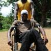 Ricardo Makyn/Staff Photographer
This Man in a Wheelchair gets some assistance in Cedar Valley at the By-election in N.E. St. Catherine