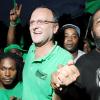 Ricardo Makyn/Staff Photographer
Jamaica Labour Party candidate Gregory Mair (centre) celebrates with jubilant supporters after winning Tuesday's by-election in the North East St Catherine constituency.