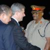 Rudolph Brown/Chief Photographer
Prime Minister Bruce Golding (left) welcomes Canadian Prime Minister Stephen Harper, (second left) to Jamaica shortly after both leaders landed at the Norman Manley International Airport yesterday. Harper and Golding  were returning from the Fifth Summit of the Americas which was held in Trinidad and Tobago. Harper is on an official visit to Jamaica.Prime Minister Harper greets Chief of Defence Staff Major General Stewart Saunders, (second right) and Police Commissioner Rear Admiral Hardley Lewin, (right)
