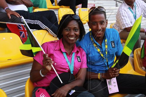 Photo Release - LIME CARIFTa Game                                                                                                                                      LIME Marketers Yanique Forbes and Stephen Miller caught ‘Jamaica Fever’ at the 40th staging of the LIME Carifta Games held at the Montego Bay Sports Club in Montego Bay this weekend.