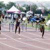 Adrian Frater photo
Jamaica's Yanique Thompson (second right) crosses the finish line to win gold in the Under-17 girls' 100m hurdles final during the LIME CARIFTA Games, at the Montego Bay Sports Complex yesterday.