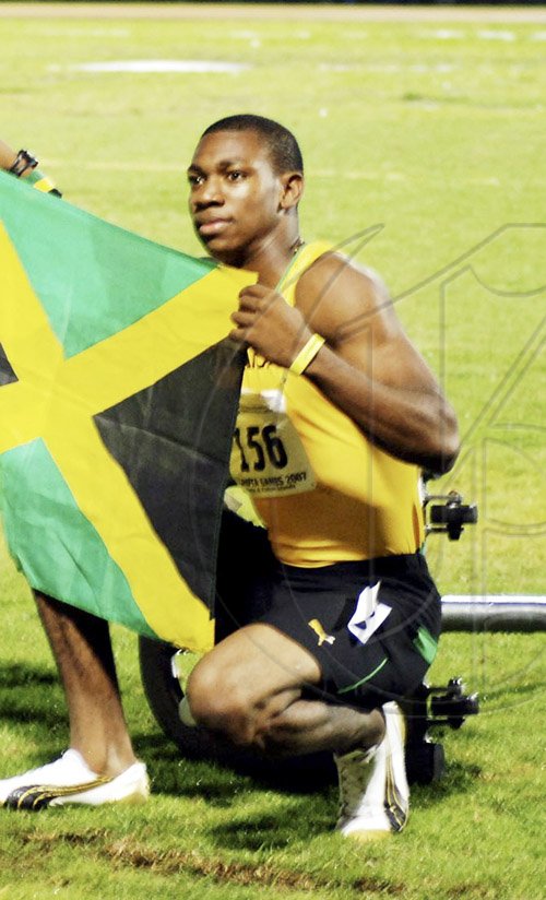 Yohan Blake








Photo by Anthony Foster
Jamaica's Yohan Blake poses after stopping the clock in a scintillating, record-breaking time of 10.11 seconds at the CARIFTA Games in the Turks and Caicos on Saturday evening. Blake, 17,  broke Raymond Stewart's 10.19 seconds, which stood for 23 years as the national junior 100-metre record.