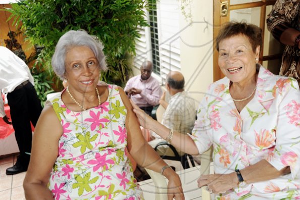 Ricardo Makyn/Staff Photographer.Good friends Ruby Martin and Gloria Moodie , are out to celebrate with Dr Carolyn Gomes.

*****************************************************************************
Function for Carolyn Gomes after receiving National Honour on Monday 19.10.2009.