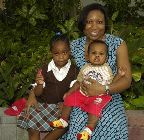 Colin Hamilton/freelance photographer
Michelle Beckford made time to hang-out with her two children Breanna, and Bradley (in lap) at the Morgans Harbour Hotel on  May 10, 2009.