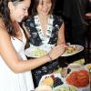 Norman Grindley /Chief Photographer
Tiffani Samms (left), serves her mother Yvonne Lee some salad from the lavish buffet at Acropolis Restaurant and Gaming Lounge in Barbican, St Andrew yesterday during mother's day brunch.