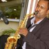Colin Hamilton/Freelance Photographer
Saxophonist Warren Harris puts his all into entertaining guests at the 'Moments with Mom' Mother's Day brunch held at the Mona Visitors' Lodge, University of the West Indies, yesterday afternoon. Moms were lavished with meals fit for queens, lots of musical entertainment and a fashion show during the Gleaner-sponsored event.