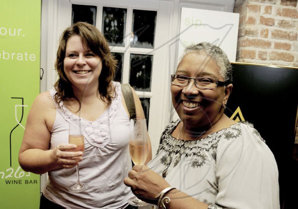 Winston Sill / Freelance Photographer
Brandie Kirkland (left) and Taynia Nethersole teasing their palates with some sparkling wine before getting down to have a taste of Armand De Brignac.


******************************************************* 

Launch of Armand De Brignac Champagne, held at Bin 26, Devon House, Hope Road on Tuesday night July 5, 2011.