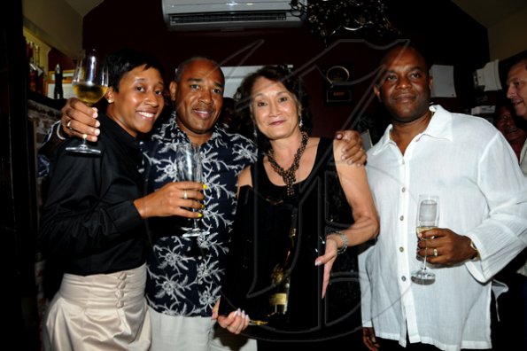 Winston Sill / Freelance Photographer
Christopher Reckord (second left) shares a happy moment with other wine enthusiasts, Jhannel Townsend (left) Thalia Lyn (second right) and Fabian Graham.

********************************************************

Launch of Armand De Brignac Champagne, held at Bin 26, Devon House, Hope Road on Tuesday night July 5, 2011.