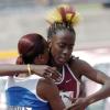 Ricardo Makyn/Staff Photographer
Edwin Allen's Sherene Pinnock (left) hugs Holmwood's Sonita Sutherland but check out the latter's up do!
*********************************************************************************************************************************hug each other after the 400m final. Sutherland won the event in a record 51.13 while Pinnock was second in 52.81.