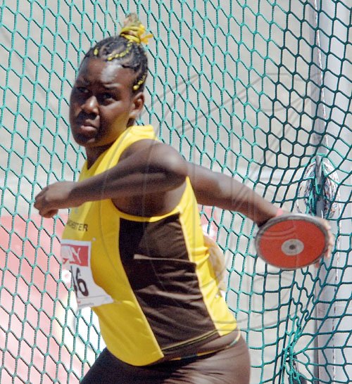 Ian Allen/Staff Photographer
Manchester High School's Sheena Powell 








winds up toi hurl the discus, in the girls' Class Three final competition on the opening day of the ISSA/GraceKennedy Boys' and Girls' Athletic Championships, at the National Stadium yesterday. Powell won with a throw of 36.96 metres.