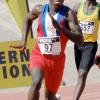 Ian Allen/Staff Photographer
Bridgeport High School's Jazeel Murphy leads the field off the turn in the Class Two boys 200m heats, on the opening day of the ISSA/GraceKennedy Boys and Girls' Athletics Championships, at the National Stadium yesterday. Murphy, the gold medal favourite, won in 21.47 seconds, the fastest time recorded over the half-lap event for the day.