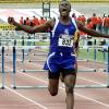 Ian Allen/Staff Photographer
Kingston College's co-captain Keiron Stewart celebrating victory in the Class One Boys 110m hurdles final at the National Stadium yesterday. Stewart clocked  13.79 seconds.