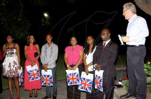 Winston Sill / Freelance Photographer

British High Commissioner Jeremy Cresswell (far right), addresses Chevening Scholars from left: Taraja Richards, Stacy-Ann Robinson, Jaevion Nelson,Titania Ward (Chevening fellow), Danielle Andrade and Harold Malcolm.

********************************************************************

British High Commissioner Jeremy  Cresswell host reception for Chevening Scholars, held at Trafalgar House, Trafalgar Road on Wednesday night September 9, 2009.