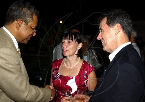 Winston Sill / Freelance Photographer
The Ambassador of the Republic of Chile Alfredo Garcia host National Day Reception, held at Millsborough Close on Friday night September 18, 2009. Here are Dr. Kenneth Baugh (left); Catty Hallihan (centre) and Stephen Hallihan (right), the Canadian Ambasdsador.